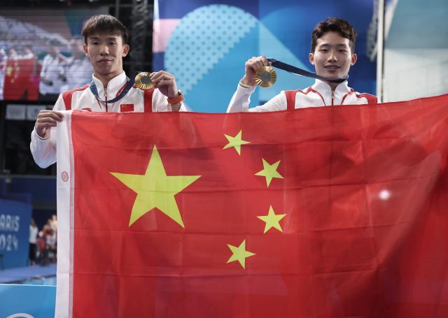 1722699419413079880.jpg 巴黎奥运会+_+跳水——男子双人3米板:中国选手龙道一_王宗源夺得金牌XxjpseC010986_20240802_MVPFN0A001.jpg